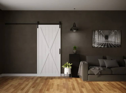 A classic X sliding wood barn door from Dogberry Collections, adding rustic refinement to your home