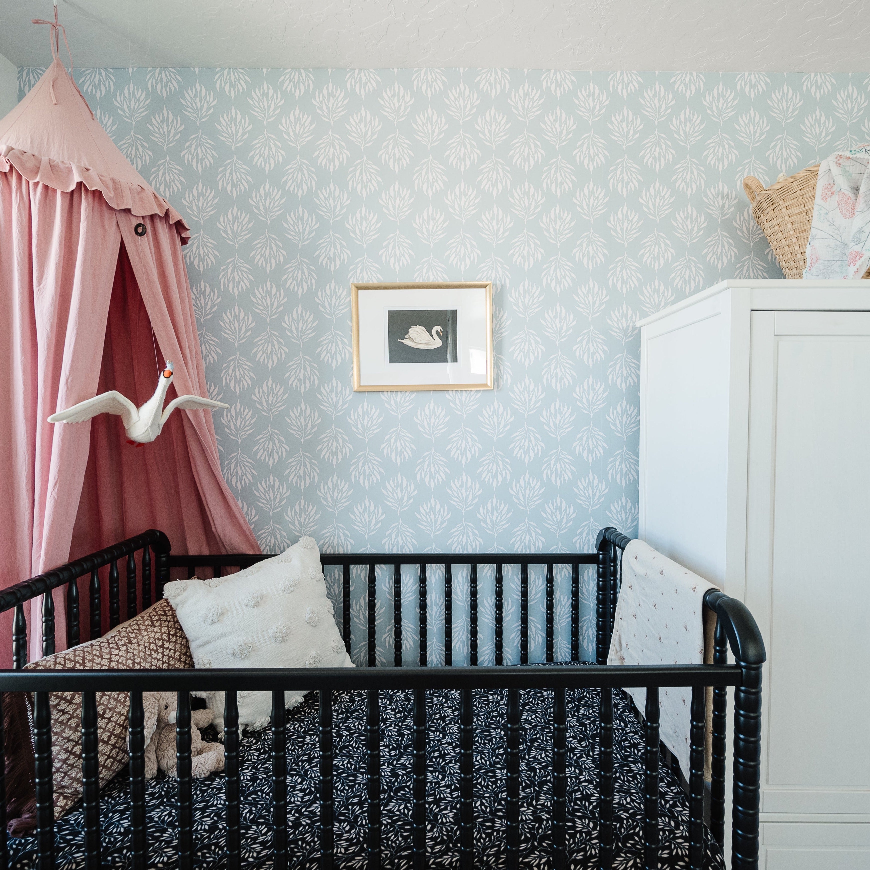 Floral peel-and-stick wallpaper installed in a beautifully styled room