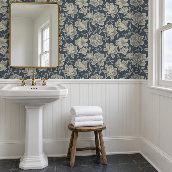 Hattie Denim peel and stick wallpaper above white beadboard in a bathroom with a pedestal sink