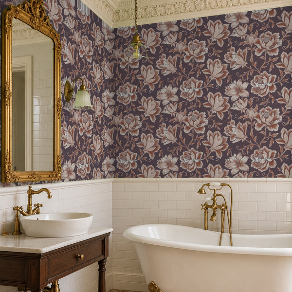 Hattie Terracotta wallpaper in a bathroom with a clawfoot tub and a gilt mirror