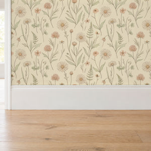 Meadow Clay peel and stick wallpaper above a white baseboard and oak floor