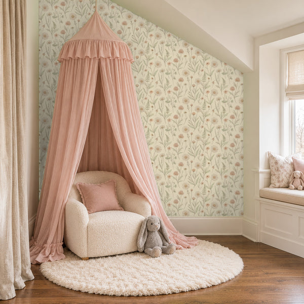 Meadow Clay peel and stick wallpaper in a girl's reading nook with a pink canopy and a window seat
