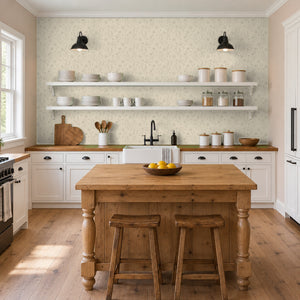 Meadow Cream peel and stick wallpaper in a kitchen with open shelves and a wood island