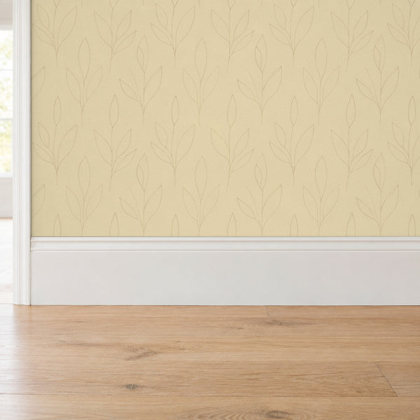 Ottilie Butter peel and stick wallpaper above a white baseboard and oak floor