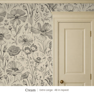 Posy Cream peel and stick wallpaper, extra large 48 in repeat, beside a cream paneled door