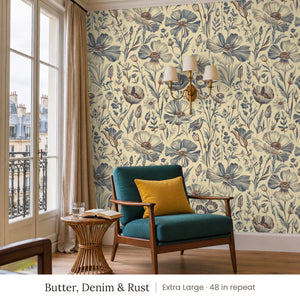 Posy Butter, Denim & Rust peel and stick wallpaper, extra large 48 in repeat, in a reading corner with a green armchair