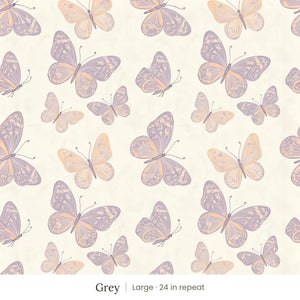 Butterfly Kisses wallpaper in Grey, large 24 in repeat, lavender and peach butterflies on a cream ground