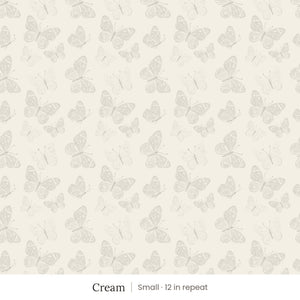 Butterfly Kisses wallpaper in Cream, small 12 in repeat, soft gray butterflies on a cream ground