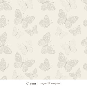 Butterfly Kisses wallpaper in Cream, large 24 in repeat, soft gray butterflies on a cream ground