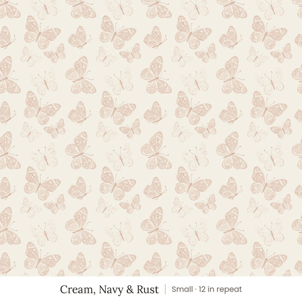 Butterfly Kisses wallpaper in Cream, Navy & Rust, small 12 in repeat, blush and rust butterflies on a cream ground