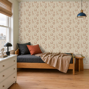 Sloe Blush peel and stick wallpaper in a kids' room with a wood daybed and navy cushions
