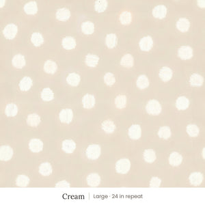 Nellie wallpaper in Cream, large 24 in repeat, soft painted cream dots on a sand ground