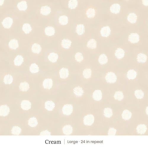 Nellie wallpaper in Cream, large 24 in repeat, soft painted cream dots on a sand ground