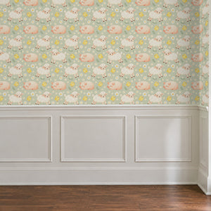 Night Night Sage peel and stick wallpaper above white panel wainscoting