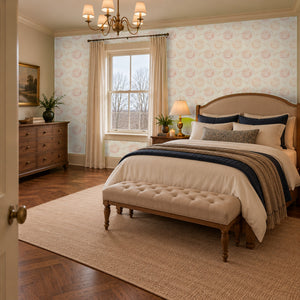Rosie Blush peel and stick wallpaper in a bedroom with an upholstered bed and a tufted bench