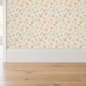 Marguerite Cream peel and stick wallpaper above a white baseboard and oak floor