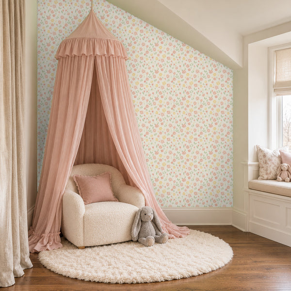 Marguerite Cream peel and stick wallpaper in a girl's reading nook with a pink canopy and a window seat