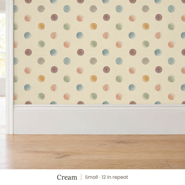 Celia Cream peel and stick wallpaper, small 12 in repeat, above a white baseboard and oak floor