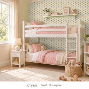 Celia Cream peel and stick wallpaper, small 12 in repeat, in a girl's room with white bunk beds and a pink quilt