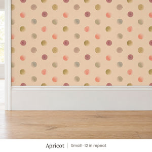 Celia Apricot peel and stick wallpaper, small 12 in repeat, above a white baseboard and oak floor