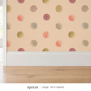 Celia Apricot peel and stick wallpaper, large 24 in repeat, above a white baseboard and oak floor