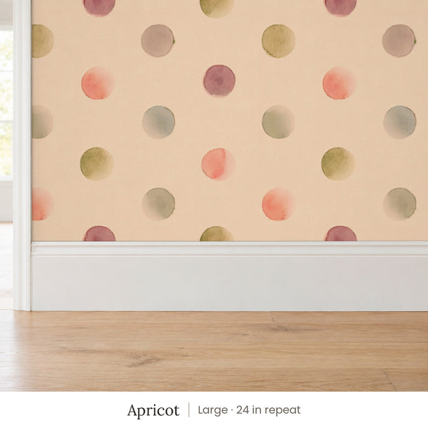 Celia Apricot peel and stick wallpaper, large 24 in repeat, above a white baseboard and oak floor