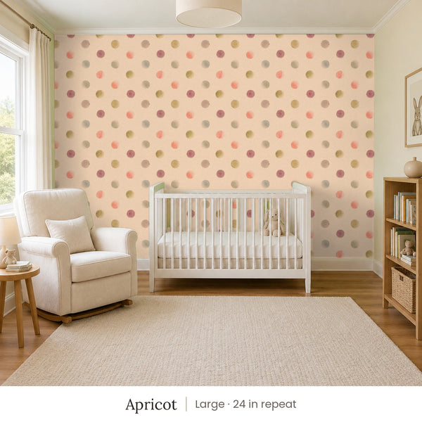 Celia Apricot peel and stick wallpaper, large 24 in repeat, in a nursery with a white crib and an armchair