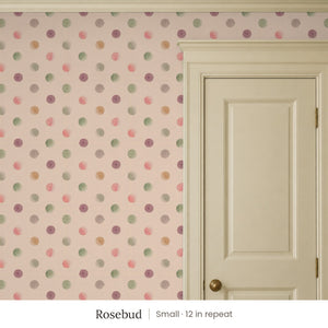 Celia Rosebud peel and stick wallpaper, small 12 in repeat, beside a cream panel door