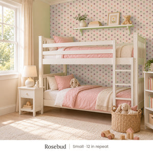 Celia Rosebud peel and stick wallpaper, small 12 in repeat, in a girl's room with white bunk beds and a pink quilt