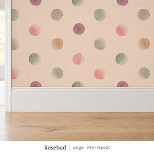 Celia Rosebud peel and stick wallpaper, large 24 in repeat, above a white baseboard and oak floor