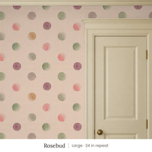 Celia Rosebud peel and stick wallpaper, large 24 in repeat, beside a cream panel door
