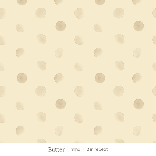 Celia wallpaper in Butter, small 12 in repeat, soft tan watercolor dots on a butter yellow ground