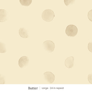 Celia wallpaper in Butter, large 24 in repeat, soft tan watercolor dots on a butter yellow ground