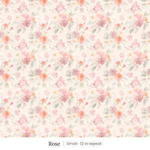 Ashwell wallpaper in Rose, small 12 in repeat, watercolor roses in pink, peach and coral with sage leaves on a blush cream ground