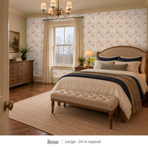 Ashwell Rose peel and stick wallpaper, large 24 in repeat, in a bedroom with an upholstered bed and a tufted bench