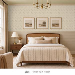 Ashwell Oat peel and stick wallpaper, small 12 in repeat, in a bedroom with shiplap paneling and framed landscape prints