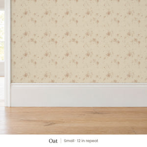Ashwell Oat peel and stick wallpaper, small 12 in repeat, above a white baseboard and oak floor