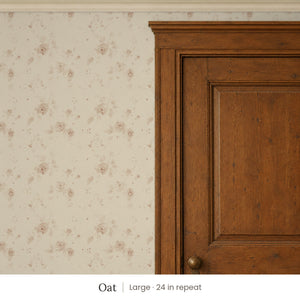 Ashwell Oat peel and stick wallpaper, large 24 in repeat, beside a dark wood panel door