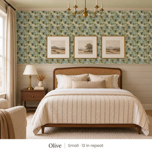 Palm Olive peel and stick wallpaper, small 12 in repeat, in a bedroom with shiplap paneling and framed landscape prints