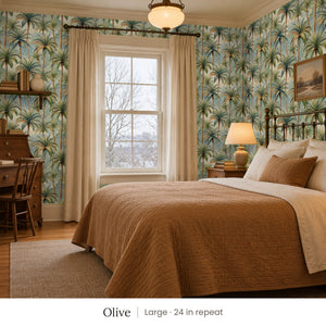 Palm Olive peel and stick wallpaper, large 24 in repeat, in a bedroom with an iron bed and a writing desk