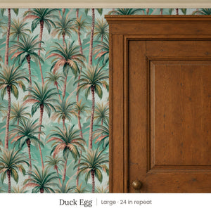 Palm Duck Egg peel and stick wallpaper, large 24 in repeat, beside a dark wood panel door