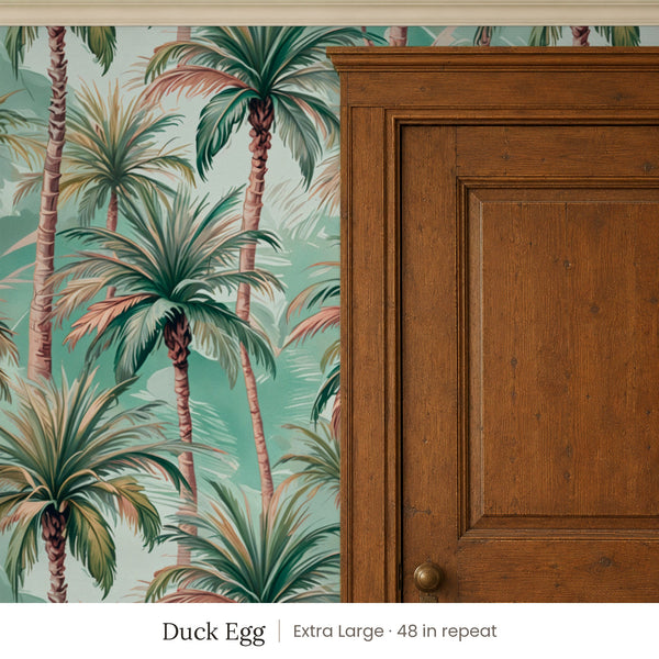 Palm Duck Egg peel and stick wallpaper, extra large 48 in repeat, beside a dark wood panel door