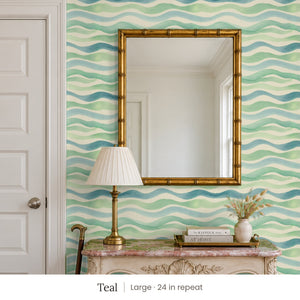 Lyme Teal peel and stick wallpaper, large 24 in repeat, in an entry with a gold mirror and a carved console