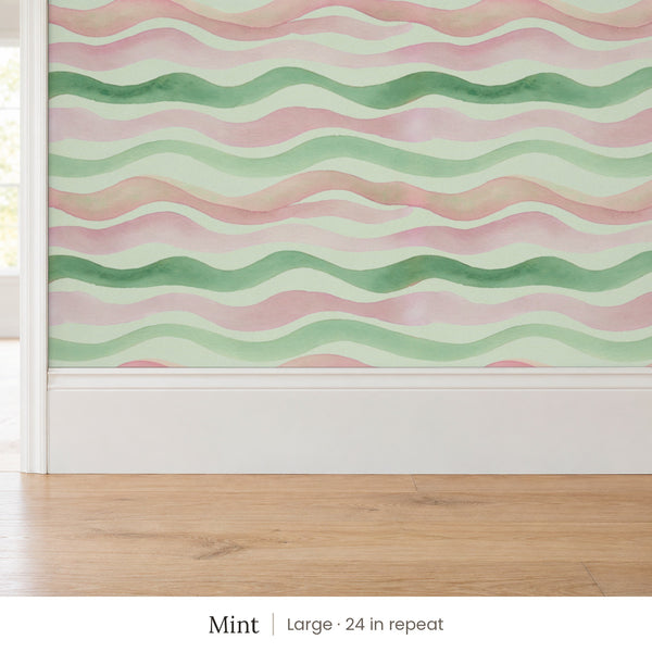 Lyme Mint peel and stick wallpaper, large 24 in repeat, above a white baseboard and oak floor