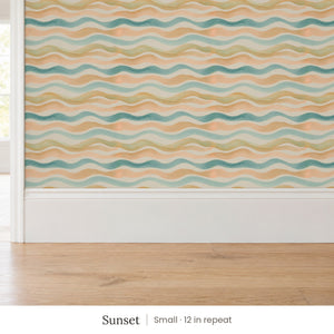 Lyme Sunset peel and stick wallpaper, small 12 in repeat, above a white baseboard and oak floor