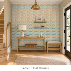 Lyme Sunset peel and stick wallpaper, small 12 in repeat, in an entry with a console table beside the stairs