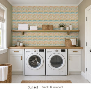 Lyme Sunset peel and stick wallpaper, small 12 in repeat, in a laundry room with white cabinets and open shelves