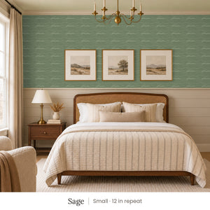 Lyme Sage peel and stick wallpaper, small 12 in repeat, in a bedroom with shiplap paneling and framed landscape prints