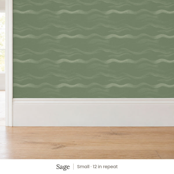 Lyme Sage peel and stick wallpaper, small 12 in repeat, above a white baseboard and oak floor