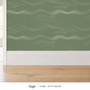 Lyme Sage peel and stick wallpaper, large 24 in repeat, above a white baseboard and oak floor